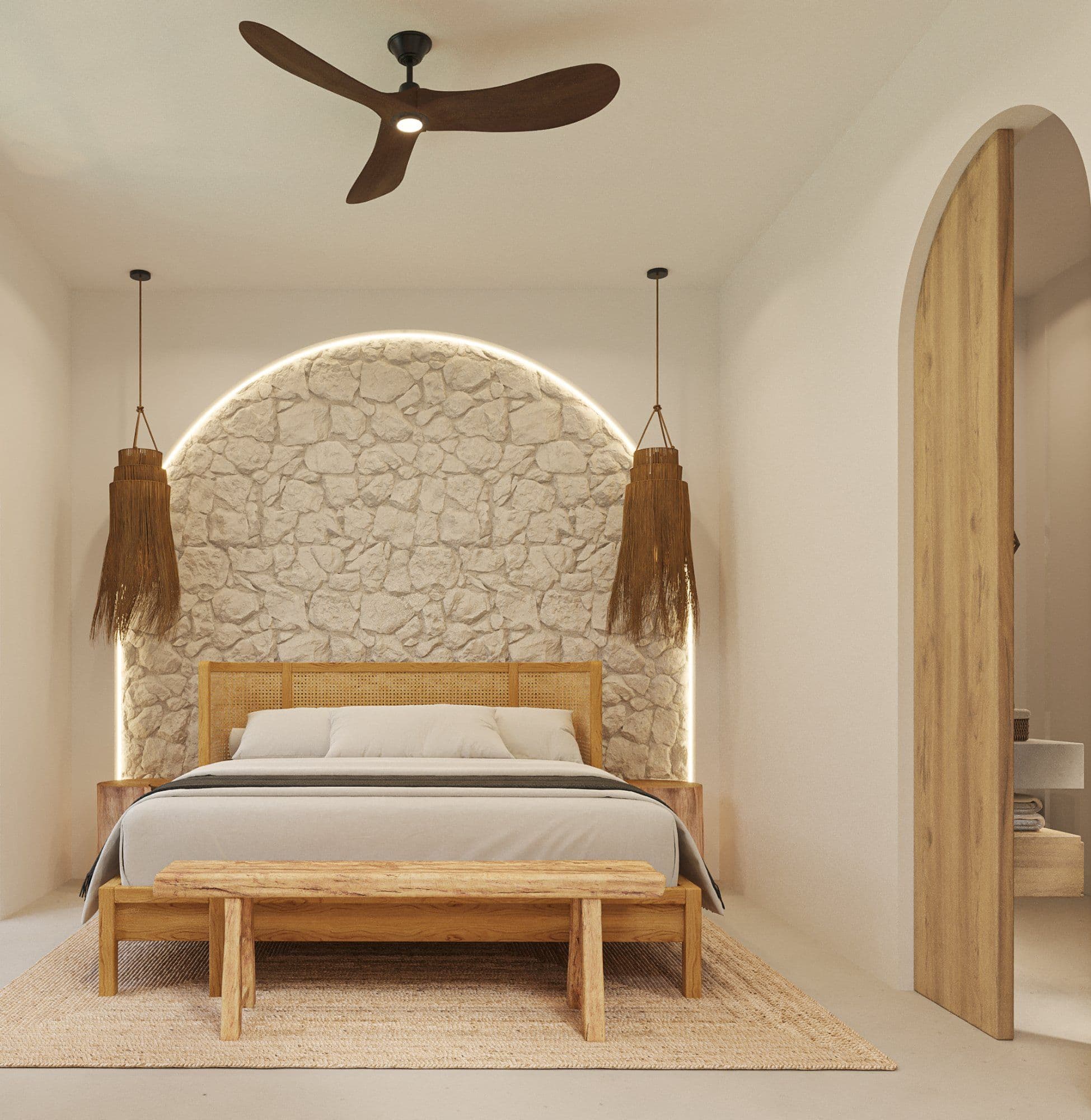 Bedroom with stone wall and arched window at CUATRO Bacalar